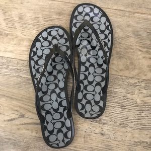 Coach flip flops sz 8 black, white and silver.